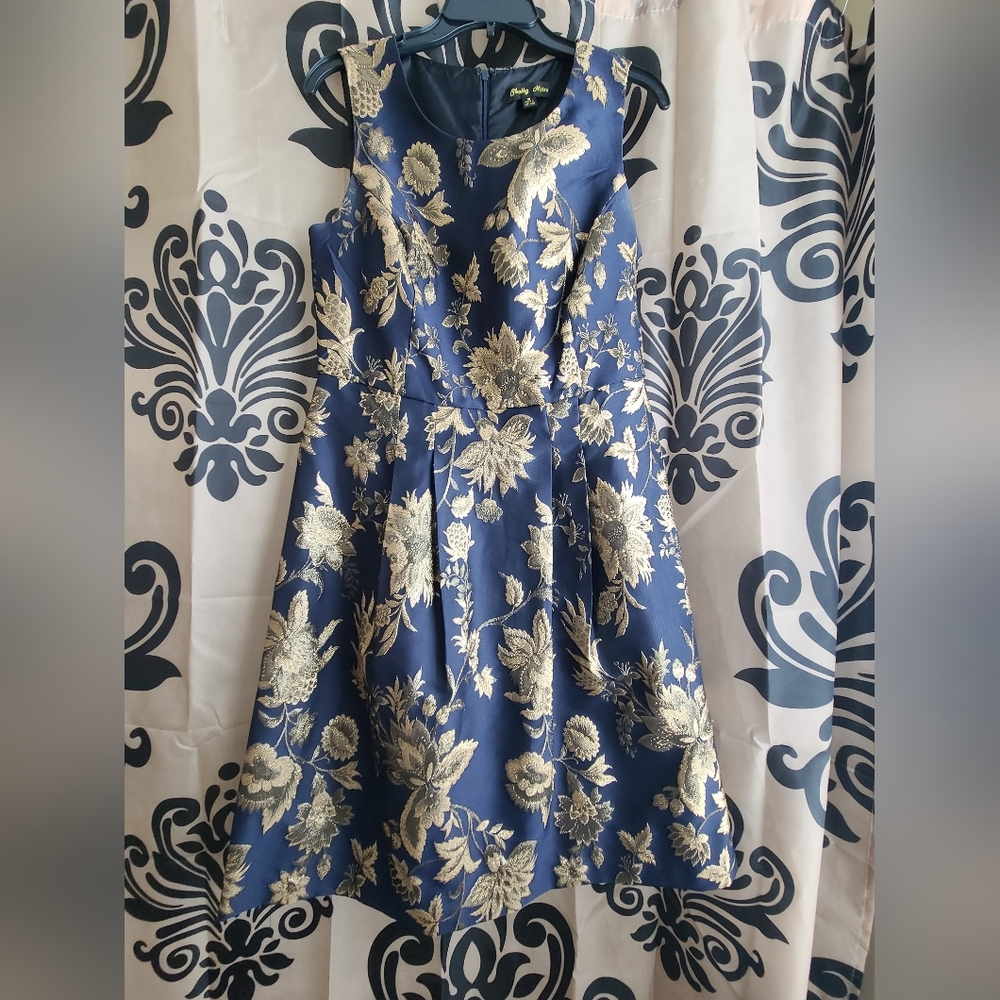 Shelby Nites Navy floral formal knee length dress.